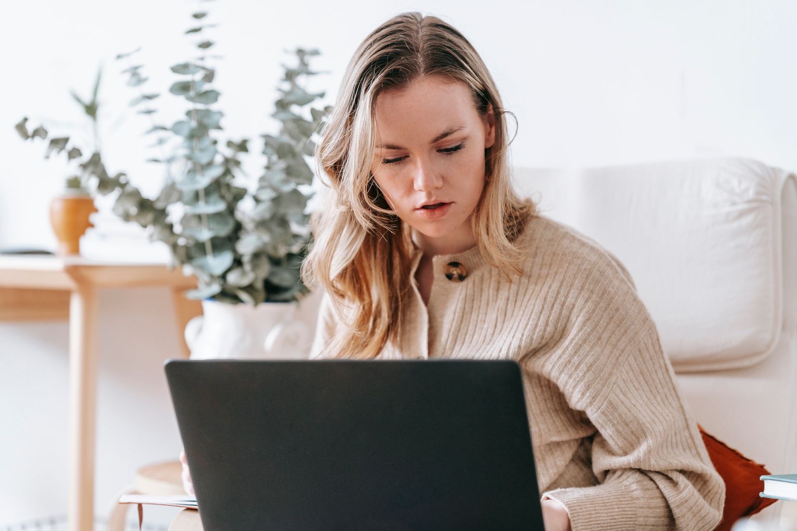 Person working on a laptop at home