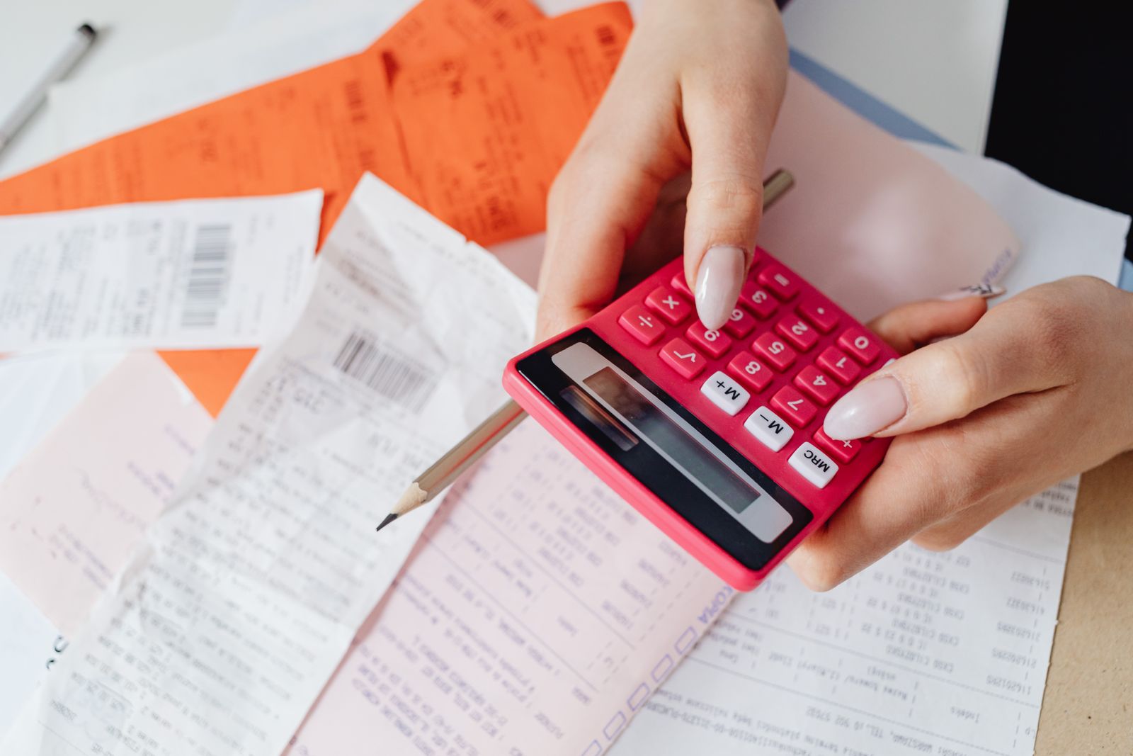 Calculator and receipts being reconciled